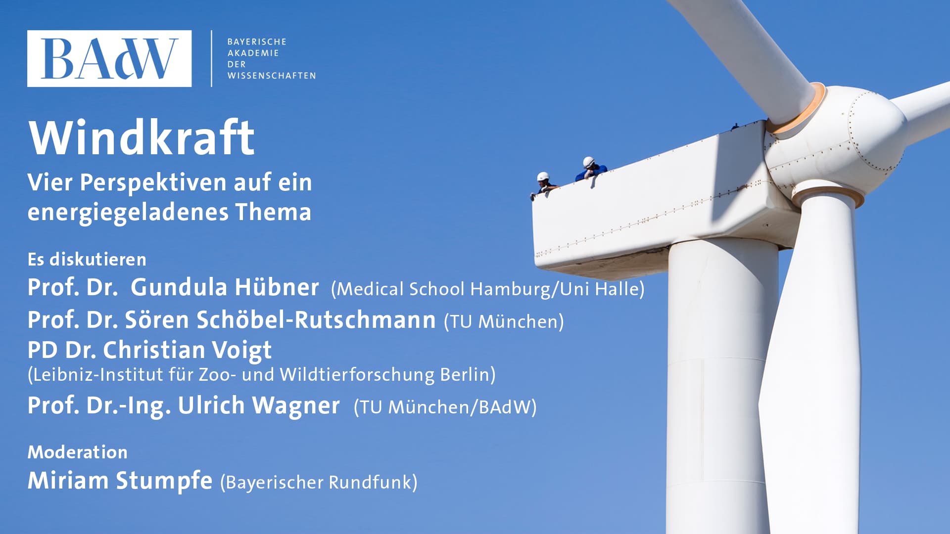 Windrad mit zwei Menschen